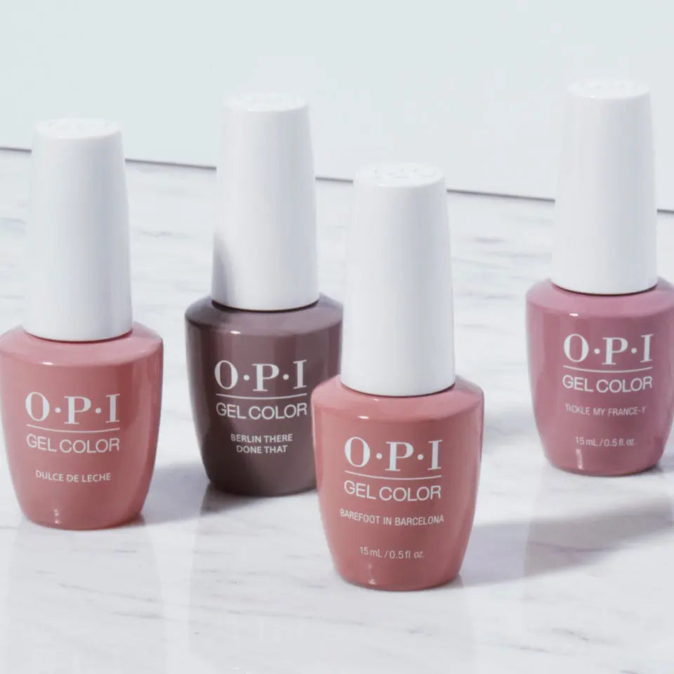 ThinkAtoZ OPI GelColor soak off gel polish bottles in various muted pink and mauve shades on marble surface