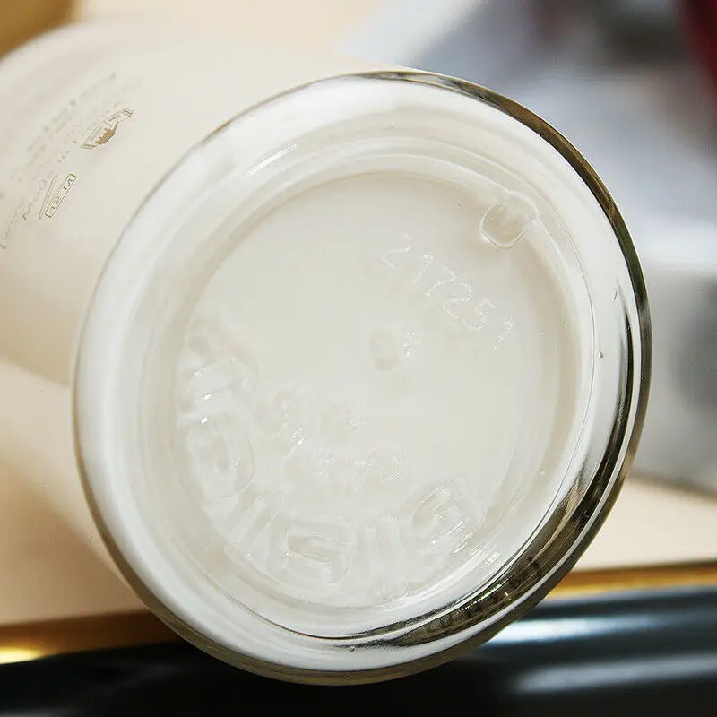 Close-up of the bottom of a Sisley Ecological Compound day night cream glass jar by ThinkAtoZ