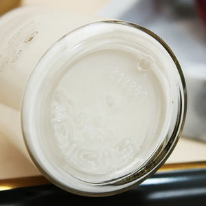 Close-up of the bottom of a Sisley Ecological Compound day night cream glass jar by ThinkAtoZ